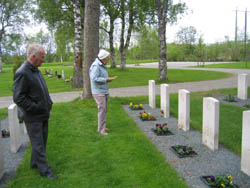 David & Wynne placing remebrance cross on S/L Websters grave