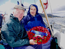 David & Wynne with the wreath they laid on the fjord