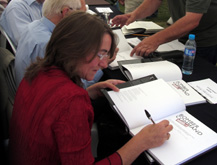 Linzee signing copies of the book at Duxford Air Show