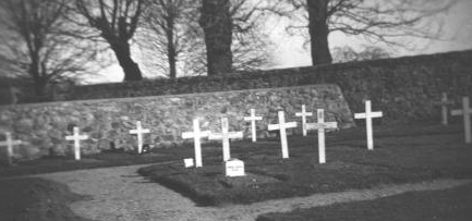 Wooden crosses at Dyce Churchyard marked the graves of the crew